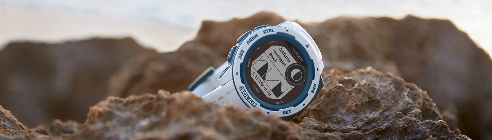 Zegarek Garmin Instinct SOLAR - Surf Edition Cloudbreak w kamuflażu, idealny do sportów wodnych.