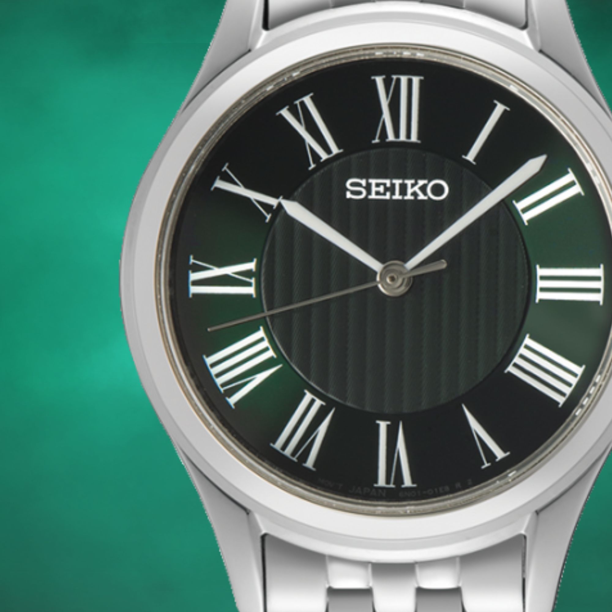 Zegarek Seiko z zieloną tarczą z cyframi rzymskimi w okrągłej, stalowej kopercie