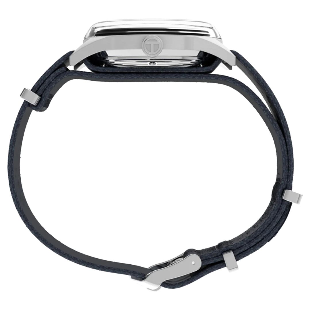 Bok zegarka Timex z okągłą kopertą ze stali na materiałowym pasku z materiału w kolorze granatowym