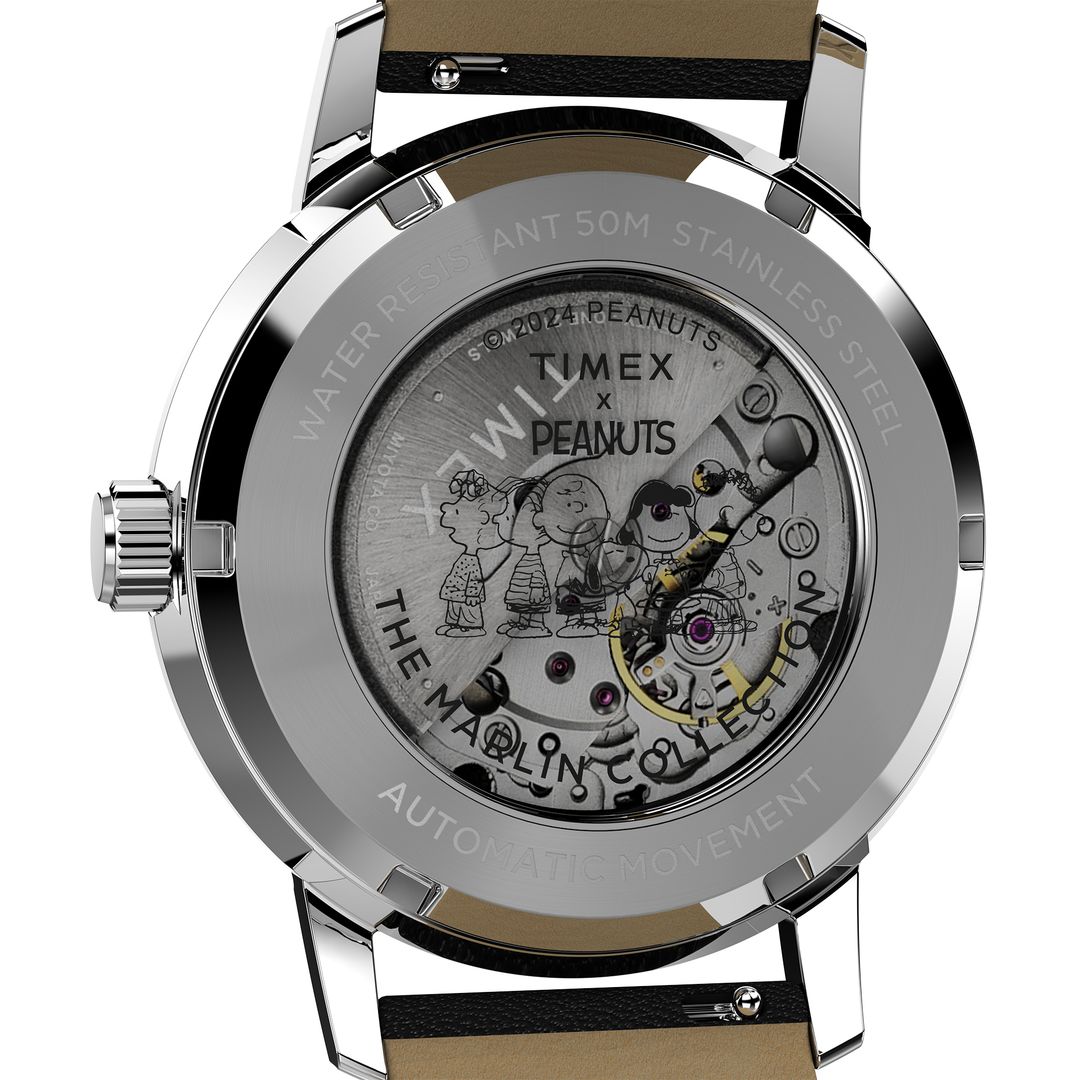Zegarek Timex z przeszklonym deklem oraz rysunkiem Snoopy'ego i przyjaciół