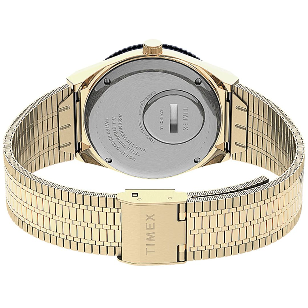 Zegarek męski Timex z zaokrągloną kopertą na stalowej bransolecie w złotym kolorze z zapięciem G-Link