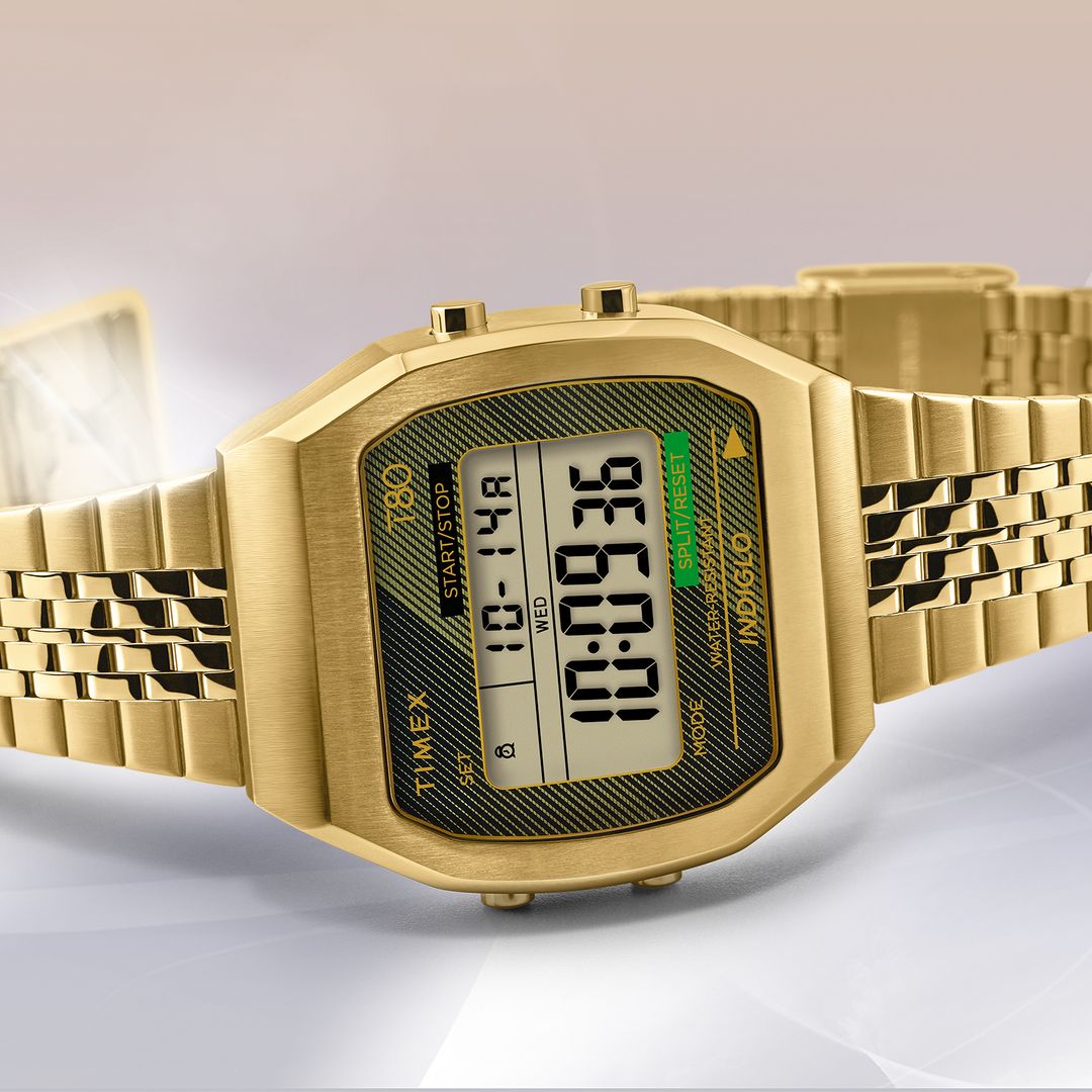 Zegarek Timex z masywną, ośmiokątną kopertą w złotym kolorze z cyfrowym wyświetlaniem czasu