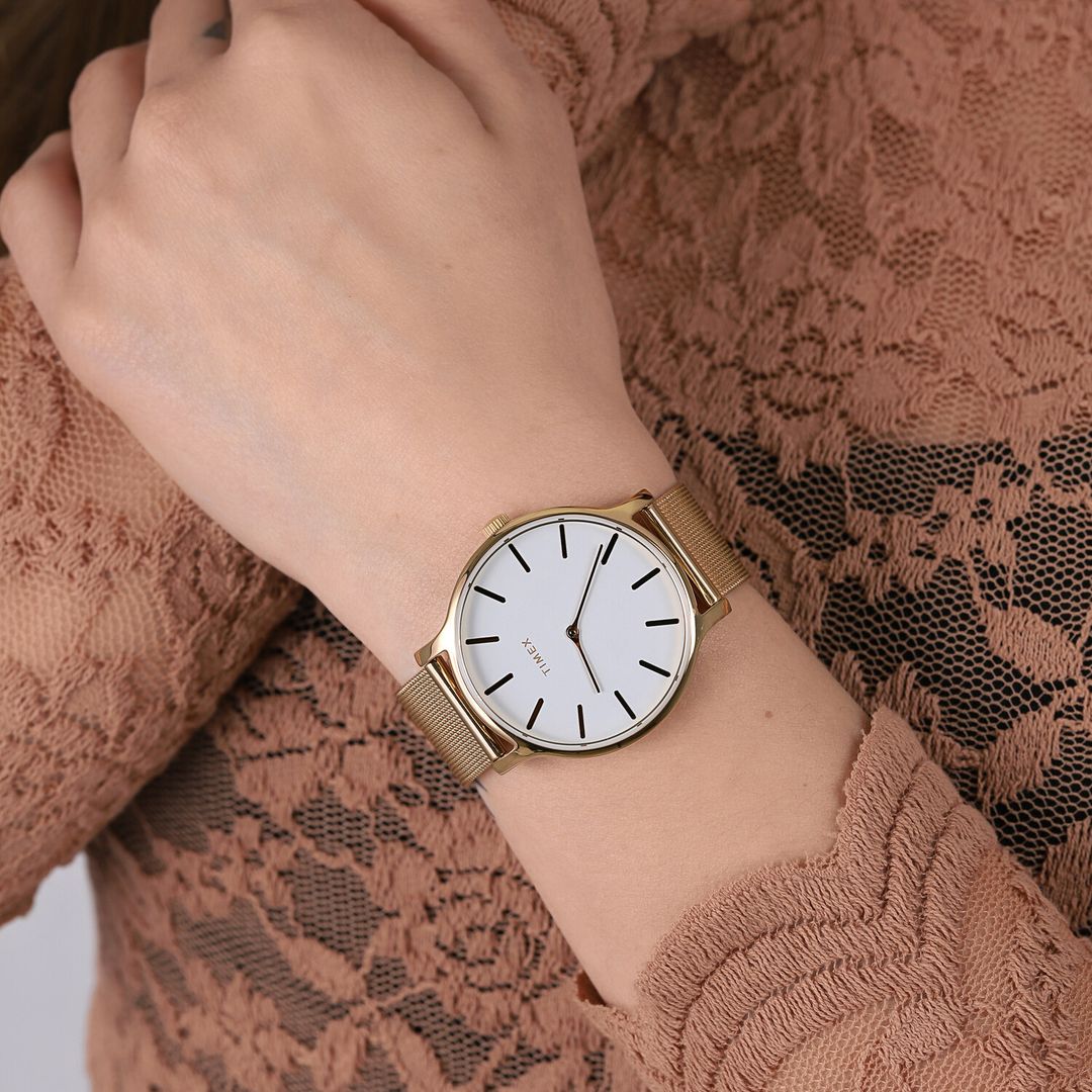 Zegarek damski Timex z okrągłą tarczą i bransoletką typu mesh w złotej kolorystyce