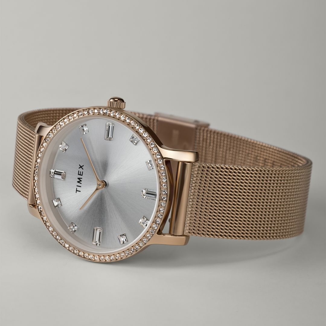 Zegarek damski Timex z okrągłą kopertą i jasną tarczą z kryształkami 