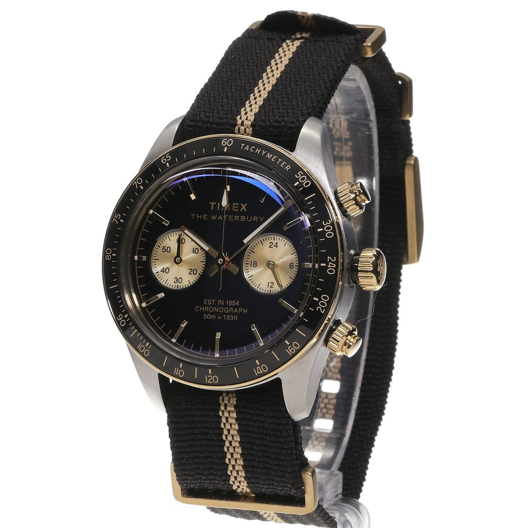 Zegarek Timex z czarną tarczą oraz złotymi subtarczami i indeksami oraz wskazówkami z powłoką luminescencyjną