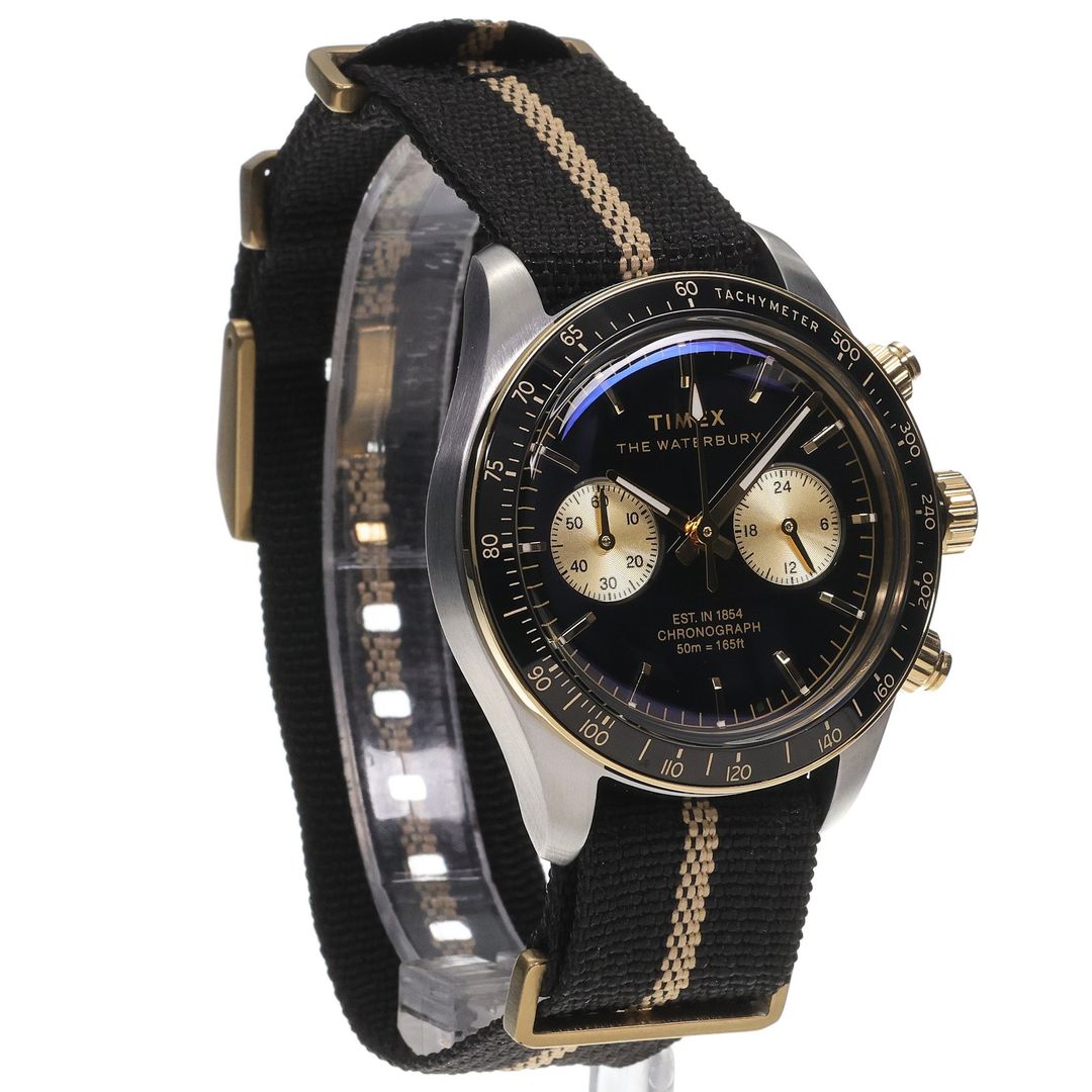 Zegarek Timex z czarną tarczą oraz czarnym bezelem na czarnym pasku z beżowym pasem po środku