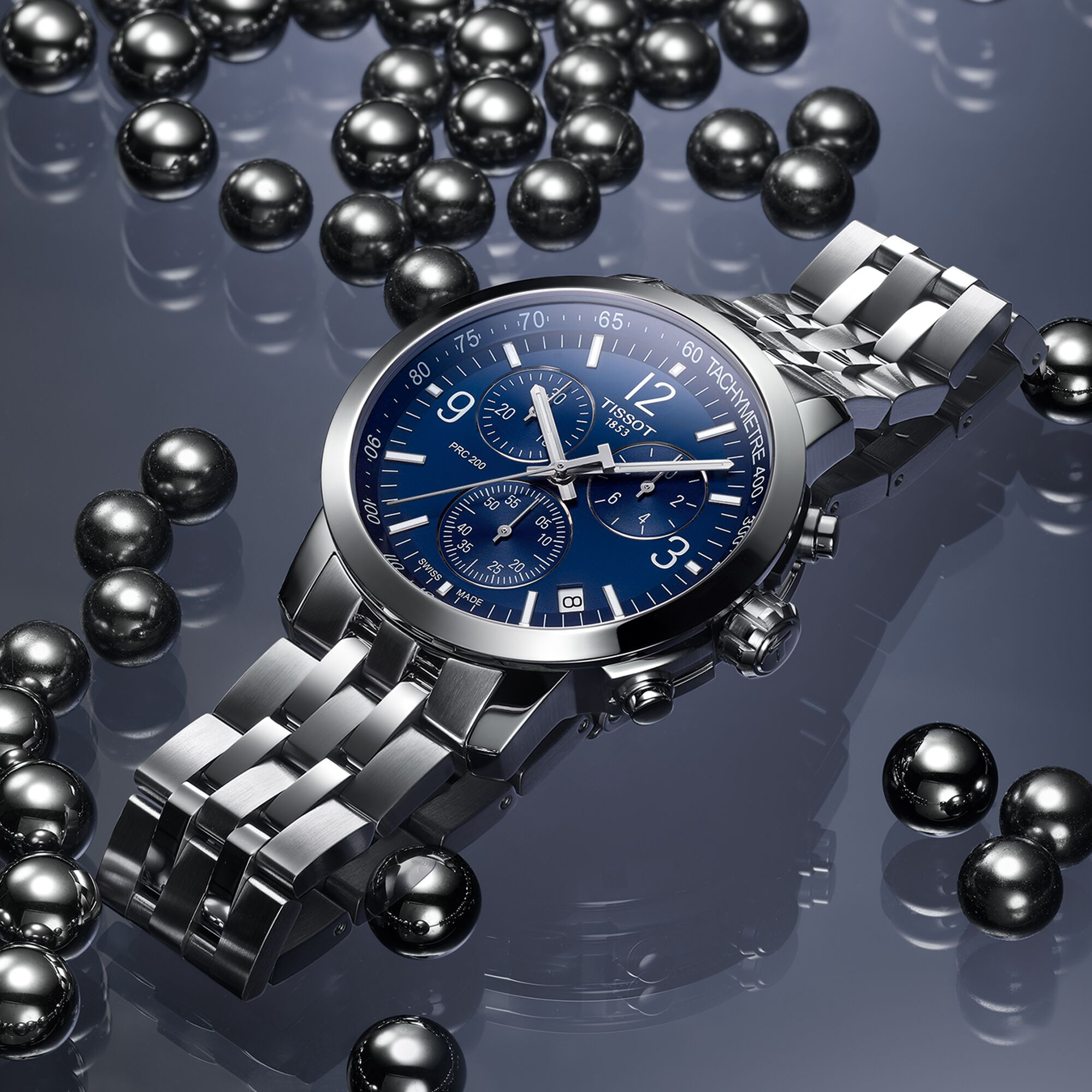 Chronograf Tissot na bransoletcie z niebieską tarczą